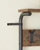 Close-up of a wall-mounted coat rack with shelves and hooks. Náhled obrázku produktu