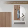 A hallway or entryway setting featuring wooden slat panels, a coat rack with a draped garment, a shelf, and a mirror. Produktbild-Vorschau