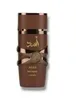 A brown perfume bottle with gold accents and Arabic writing. Anteprima dell’immagine prodotto