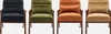 Four armchairs of different colors are displayed side-by-side against a white background. Produktbild-Vorschau