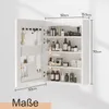 A white bathroom cabinet with its door open, displaying various toiletries and personal care items on shelves. Dimensions are indicated with measurement lines. Náhľad obrázku produktu