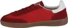 A side view of a single red sneaker. Voir les images du produit