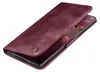 A burgundy flip cover case for a smartphone is shown from a diagonal angle, with the cover partially open to reveal the phone screen. Produktbild-Vorschau