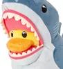 A close-up shot of a plush shark toy with its mouth open, revealing a plush duck inside. Podgląd zdjęcia produktu