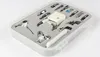 A set of sewing machine presser feet in a plastic box. Produktbild-Vorschau