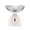 A retro-style analog kitchen scale with a stainless steel bowl. Voir les images du produit