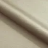 A close-up, diagonal view of a roll of fabric. Podgląd zdjęcia produktu