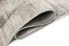 A close-up view of a rolled-up rug, showing the texture and edge. Anteprima dell’immagine prodotto