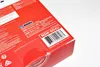 A close-up view of the corner of a red product box, showing a barcode and manufacturer information. Podgląd zdjęcia produktu