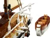 Close-up view of a Lego ship and a separate Lego boat. Voir les images du produit