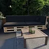 An outdoor patio setting with a pallet sofa and coffee table. Produktbild-Vorschau