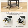 A close-up view of the wheels of a black kitchen cart, highlighting its mobility features. Náhled obrázku produktu