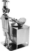 A metal figurine of a chef cooking on a stove. Produktbild-Vorschau