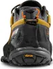 Close-up view of the back of a hiking shoe. Voir les images du produit