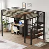 A loft bed with a desk and stairs in a room. Produktbild-Vorschau