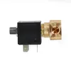 A solenoid valve with brass fittings against a white background. Produktbild-Vorschau