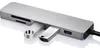 A silver USB-C hub with multiple ports and two USB drives inserted. Produktbild-Vorschau