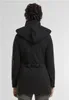 Back view of a woman wearing a black hooded jacket. Produktbild-Vorschau