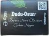 Close-up of the front of a black soap packaging box. Anteprima dell’immagine prodotto