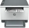 A white and gray HP LaserJet MFP M234dw printer is shown from the front, with a document partially printed and sticking out of the paper tray. Podgląd zdjęcia produktu