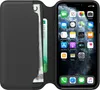 A black leather flip case for an iPhone, with the phone displaying its home screen. Náhľad obrázku produktu