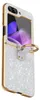 A glittery phone case with a gold ring holder is shown against a white background. Produktbild-Vorschau
