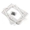 A white plastic skimmer flange set and screws on a white background. Produktbild-Vorschau