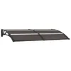 A black awning with white accents mounted on a white background. Produktbild-Vorschau