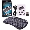 A collage of a wireless mini keyboard with its packaging, accessories, and an instruction manual. Anteprima dell’immagine prodotto