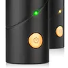 Close-up of two black electronic devices with gold power buttons and indicator lights. Náhled obrázku produktu