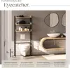 A modern bathroom shelf unit with a toilet and sink in the background. Produktbild-Vorschau