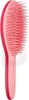 A pink hairbrush is shown against a white background. Voir les images du produit