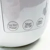 A close-up view of the control panel of a white rice cooker. Voir les images du produit
