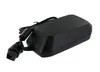 A black e-bike charger with cables and connectors is shown against a white background. Produktbild-Vorschau