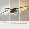 A modern geometric LED ceiling light fixture shown in three different lighting conditions: white light, natural light, and warm light. Podgląd zdjęcia produktu