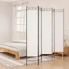 A room with a bed and a room divider. Podgląd zdjęcia produktu
