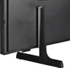 The back of a black TV with its stand attached. Náhľad obrázku produktu