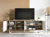 A modern TV cabinet in a living room setting with a TV on top and decorative items on shelves. Produktbild-Vorschau
