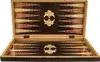 An open wooden backgammon board with decorative inlay. Voir les images du produit