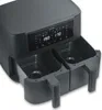 A close-up, angled view of a black dual-basket air fryer. Produktbild-Vorschau