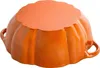 A close-up, angled view of an orange Staub pumpkin-shaped cast iron pot on a white background. Produktbild-Vorschau