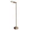 A floor lamp with a circular head and a thin stem, standing on a circular base. Anteprima dell’immagine prodotto