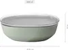 A light green salad bowl with a clear lid is shown from the side. Produktbild-Vorschau