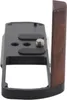 A close-up, side view of a camera grip accessory. Podgląd zdjęcia produktu