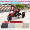 A red and black children's tricycle is shown outdoors on a paved surface, with various road surfaces depicted below. Náhled obrázku produktu