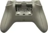 The back of a white Xbox Wireless Controller with the battery compartment open. Produktbild-Vorschau
