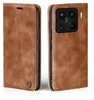 A brown leather flip case for a smartphone is shown from two angles. Produktbild-Vorschau