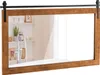 A rectangular mirror with a wooden frame, designed to look like a barn door, is mounted on a wall above a bathtub. The mirror reflects a bathroom shelf with a plant and shower fixtures. Podgląd zdjęcia produktu