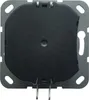 A close-up, front-facing view of a dimmer insert for an electrical switch, mounted on a gray metal frame. Náhľad obrázku produktu