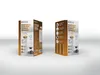 Two boxes of ECG KM 150 Minimo portable electric coffee grinders are displayed against a light gray and white background. Podgląd zdjęcia produktu